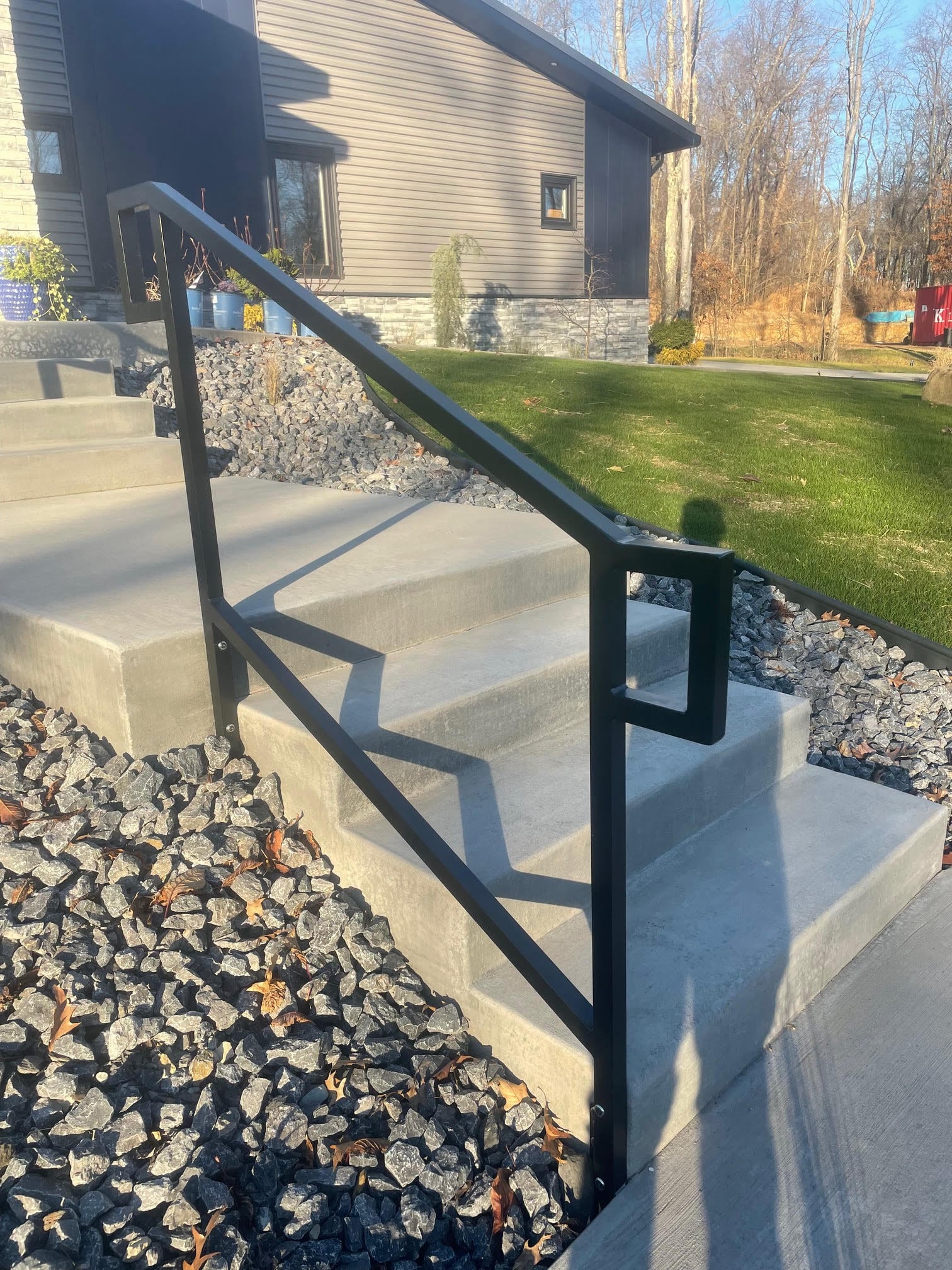 concrete steps and rail